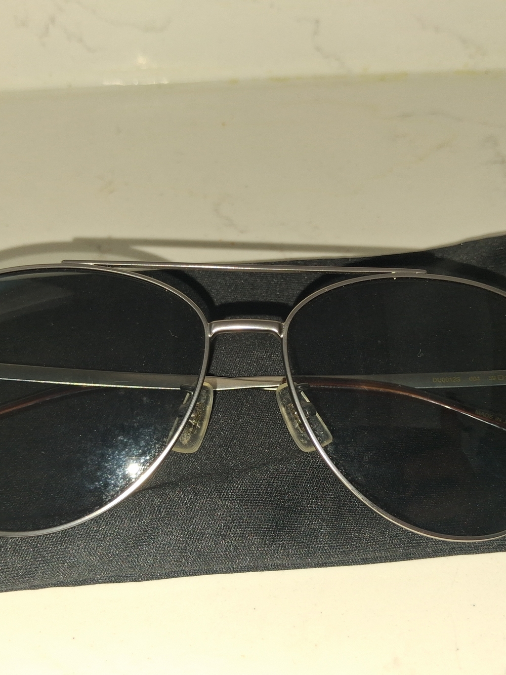 Dunhill Aviator Sunglasses showcases a classic double-bridge metal frame paired